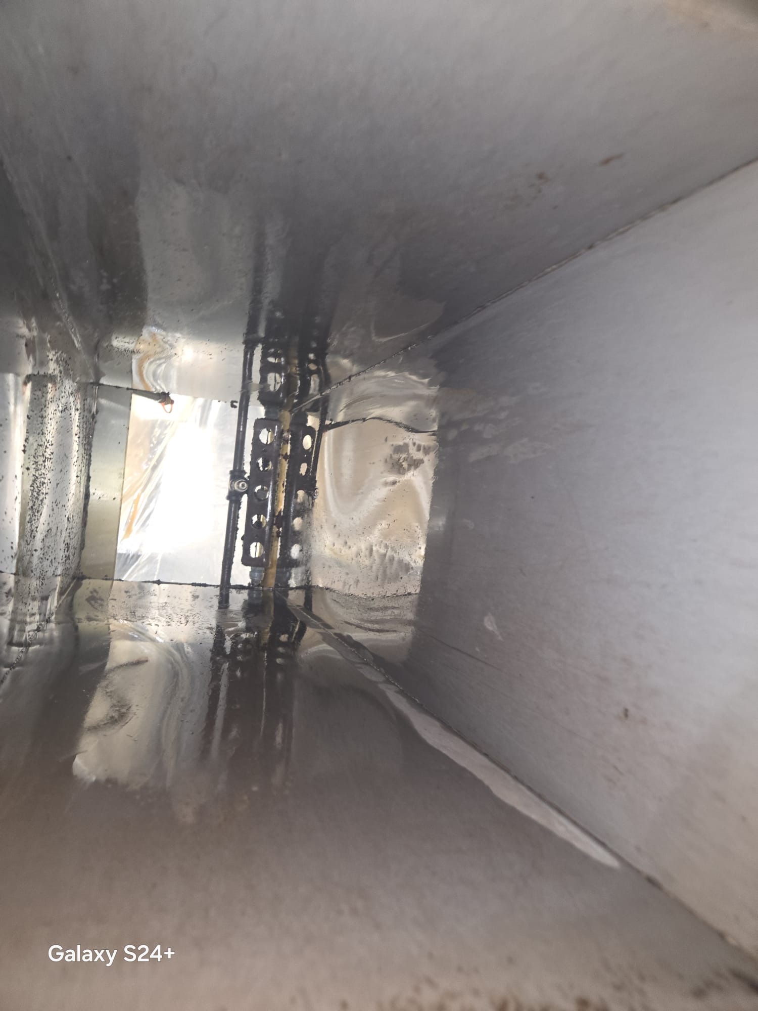Duct after cleaning to bare metal