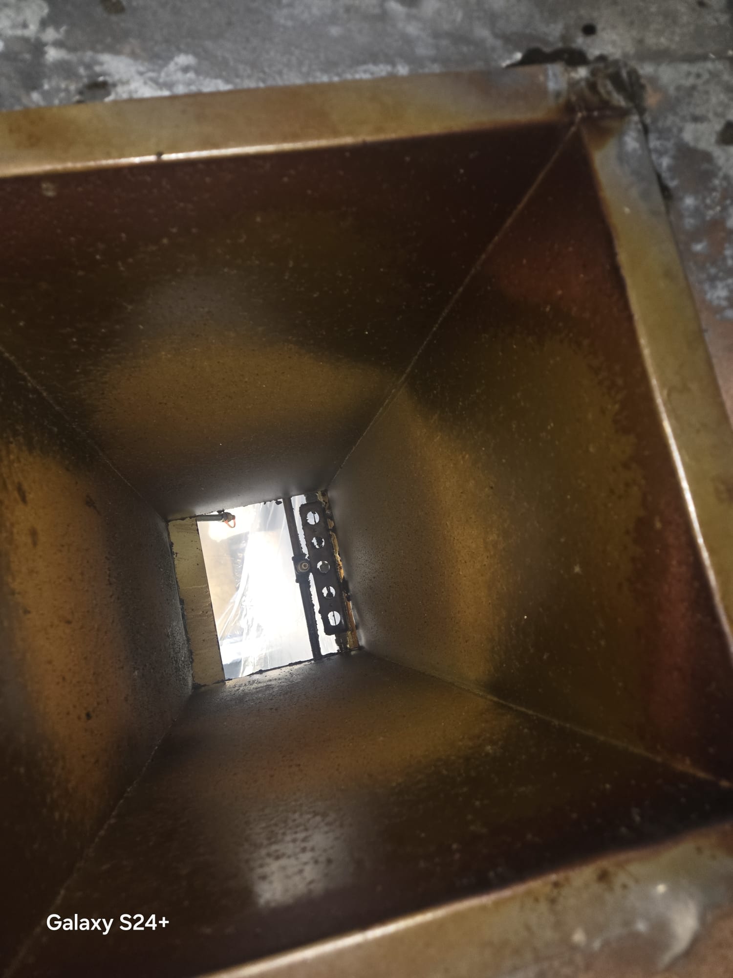 Grease buildup before duct cleaning