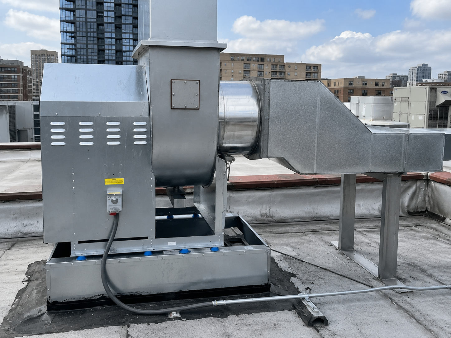 Hood hinge installation on commercial exhaust hood
